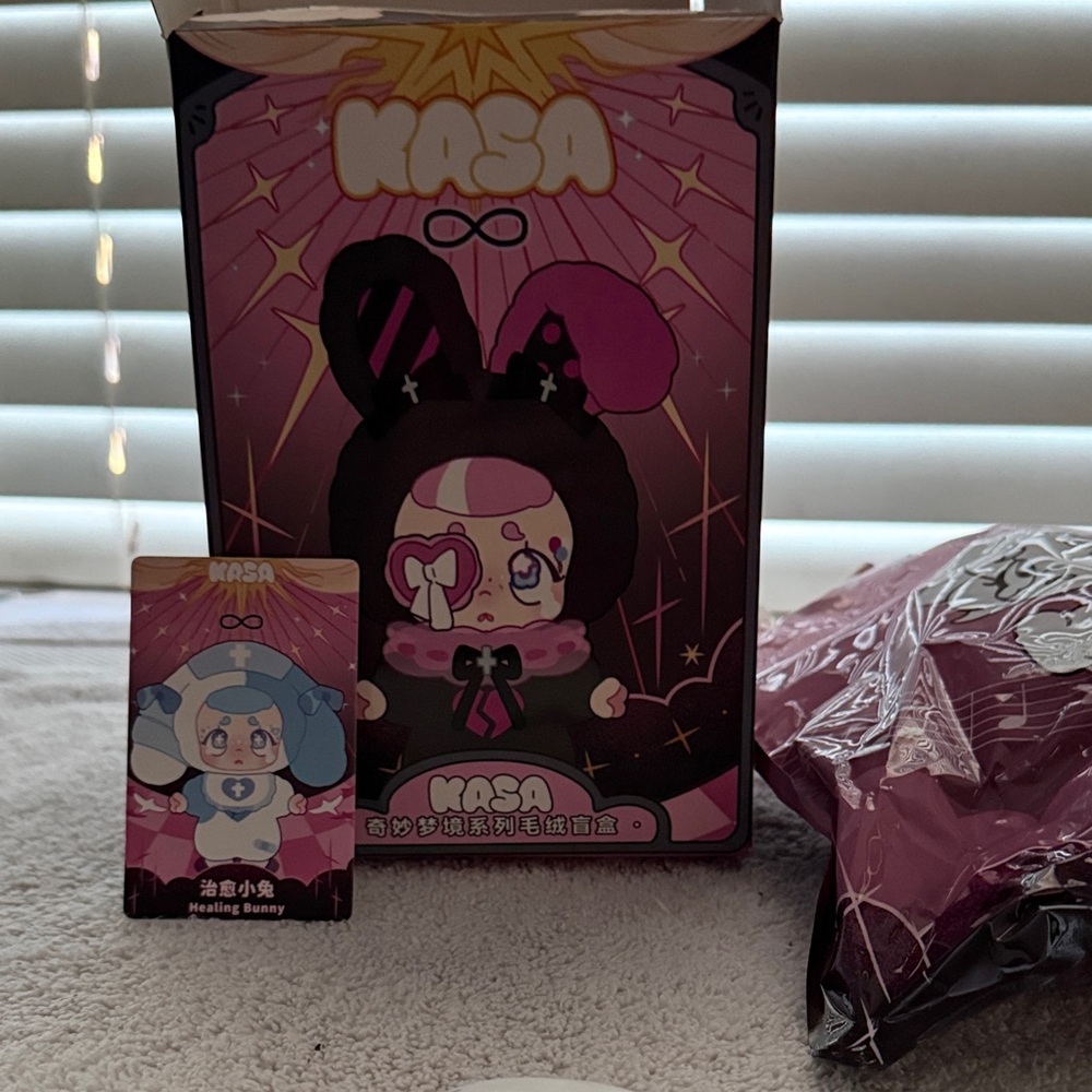 Pink and Black Doll with Accessories